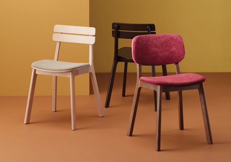 Three variations of the Brooke dining chair: wood seat and back, upholstered seat and wood back, and fully upholstered.